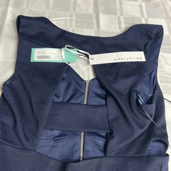 ANTHROPOLOGIE. CUT OUT MINI FIT & FLARE BLUE DRESS WITH FRONT ZIPPER - Picture 12 of 14